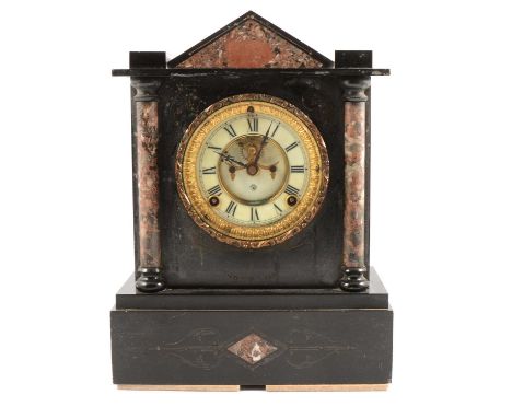 Late Victorian slate and marble mantel clock, of architectural form, circular dial with visible escapement, Ansonia movement,