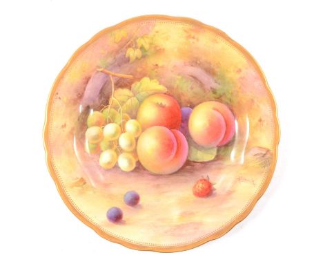 Royal Worcester fruit painted cabinet plate, with peaches and gooseberries, signed A Shuck, 23cm.