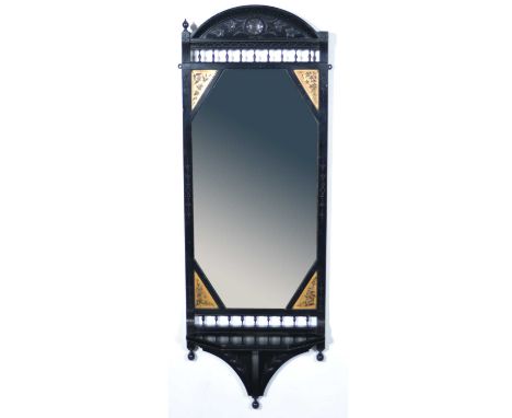 Aesthetic Movement ebonised pier-glass, arched top with balustrade rail, rectangular plate with painted gilt-ground spandrels