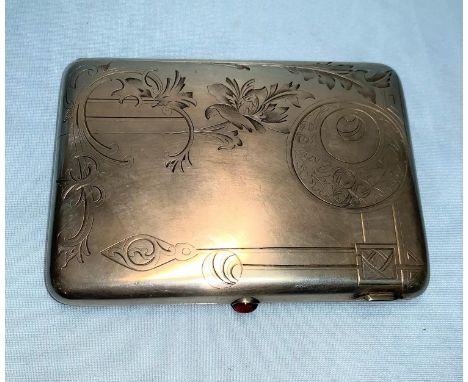 A Russian silver cigarette case, kokoshnik for Moscow, decorated in the Art Nouveau manner with stylized plants, etc., set wi