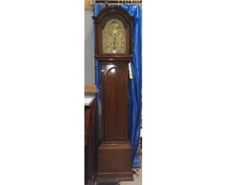 An 18th/19th century mahogany longcase clock with arch top hood and full length door, arched brass dial and 8 day movement by