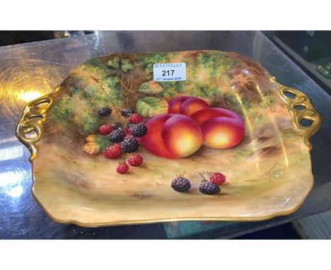 A Royal Worcester shallow rectangular dish decorated in polychrome with blackberries and peaches, signed 'E Townsend', length