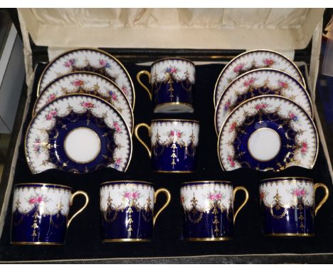A Copeland Spode's set of 6 china coffee cups and saucers decorated with roses, cased 