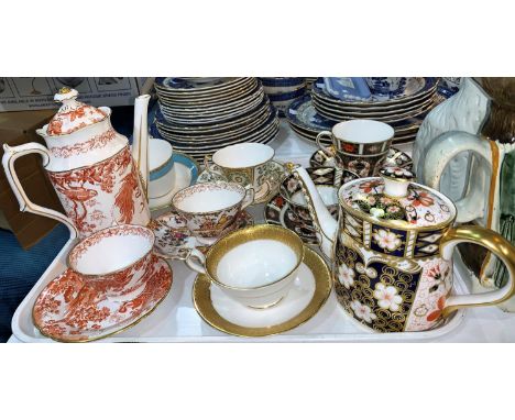 A Royal Crown Derby teapot; a harlequin set of cups and saucers; etc. 
