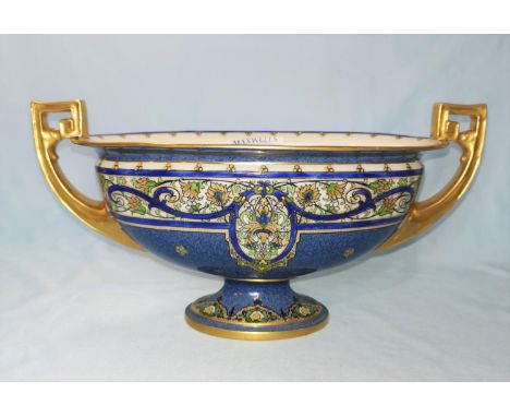 A Royal Worcester 2 handled oval pedestal bowl in gilt and powder blue, with floral scroll band decoration, width 29cm 