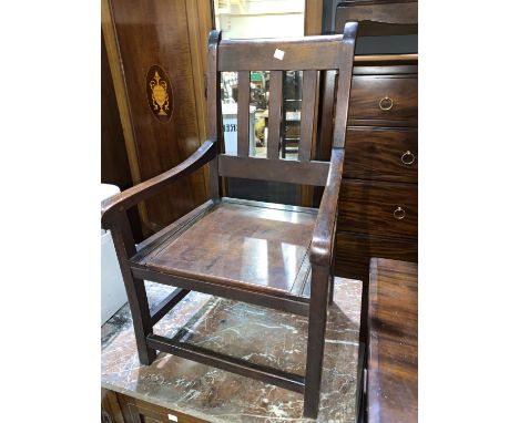 A 19th century child's mahogany commode chair 