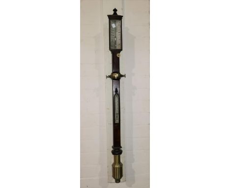 A Georgian marine barometer in mahogany case, with thermometer, having silvered dial, brass base and gimbal, by Steele &amp; 