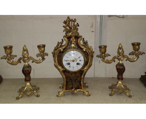 A late 19th century French clock garniture, ormolu mounted rococo style boulle work, 8 day striking movement, lyre finial, he