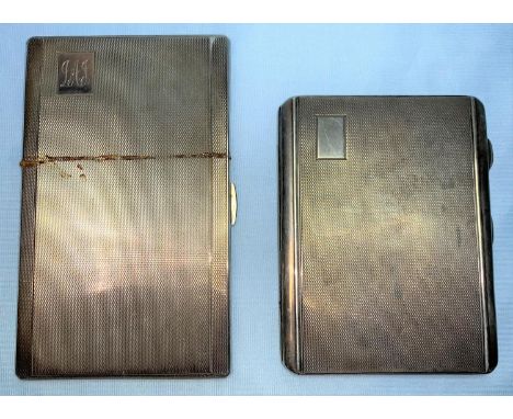 Two Art Deco silver cigarette cases, engine turned decoration, 11.05 ozt 
