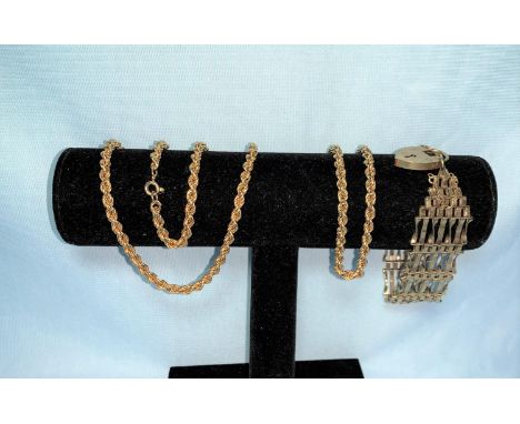 A 9 carat gold gate bracelet; a 9 carat gold rope twist bracelet; a similar continental necklace, tests as 9 ct, 34.8 gm 