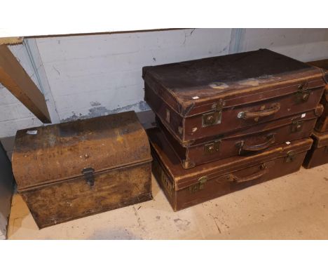 A tin trunk; 5 leather suitcases 