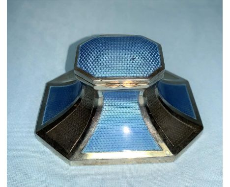 A shaped rectangular capstan inkwell, in blue enamel silver, weighted base, Birmingham 1924, 9cm wide 