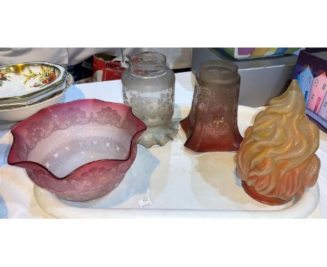 An oil lamp shade in cranberry and engraved glass; 3 others 