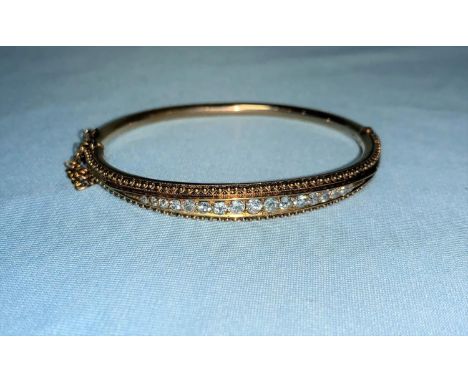 A 19th century hinged bangle set 17 old cut graduating diamonds, 12,8 g approx. gross weight, 1.82 ct approx. diamond weight 