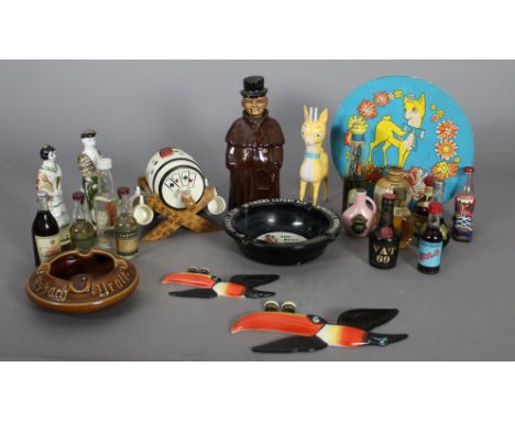 Two Carltonware 'Guinness Toucan' wall plaques, Babycham plastic model and card plaque and a quantity alcoholic miniatures an