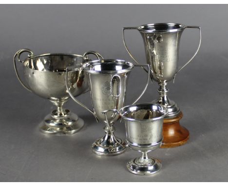 Four early 20th Century silver trophies awarded to Sri Lankan Assistant Surveyor General C.H. Vince - two issued by the 'Colo