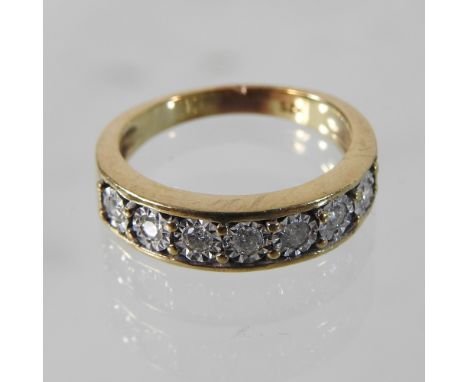 An unmarked diamond set eternity ring, boxed 