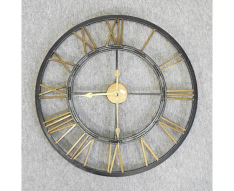 A metal framed wall clock, 70cm diameter