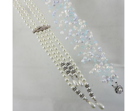 A Guy Laroche four strand simulated pearl necklace, and another