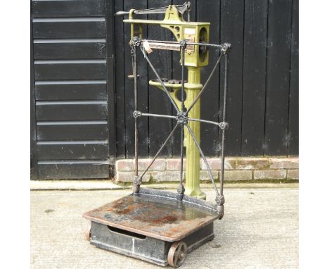 A set of mid 20th century cast iron and green painted potato scales, 127cm high