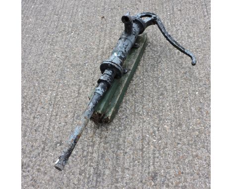 A vintage cast iron water pump, 120cm high