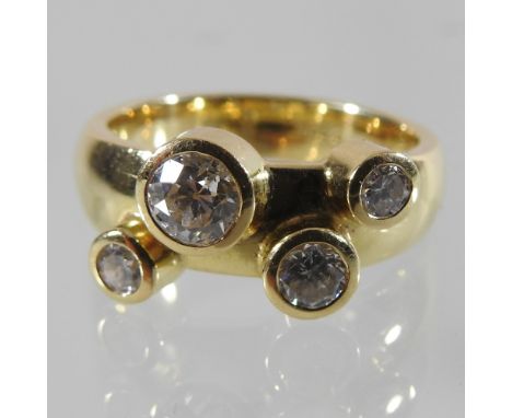 An 18 carat gold bespoke-made four stone diamond ring, with valuation certificate