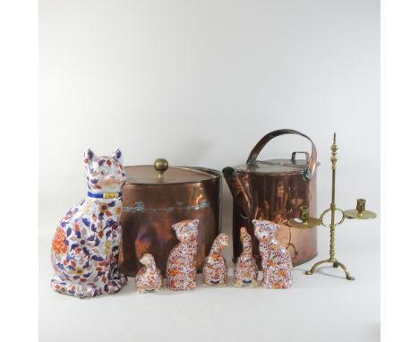 A Victorian copper watering can, together with a copper pot, a brass candlestick and a collection of Imari style animals, hig