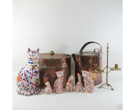 A Victorian copper watering can, together with a copper pot, a brass candlestick and a collection of Imari style animals, hig