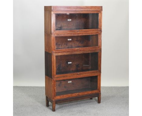 An early 20th century Globe Wernicke glazed four tier sectional bookcase, 87cm