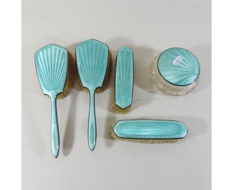 An early 20th century silver and guilloche enamel dressing table set, to include a hand mirror and brushes, by Charles Green 