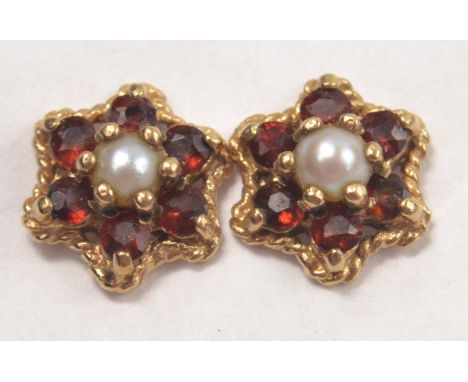 Ruby and Pearl floral design stud earringsGross weight approx 1.20g