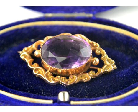 Stunning vintage oval shaped amethyst set in 9ct scrolled broochL: 4cm approx  W: 2cm approx Gross weight approx 6.5g