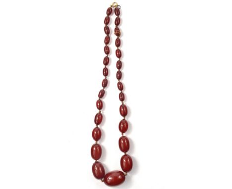 STUNNING! A Vintage string of reddish graduated beadsApprox 1 pieces