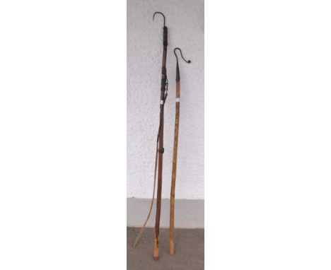 Two very vintage hooks to include shepards hook (L:125cm) and fishing staff (L:145cm)