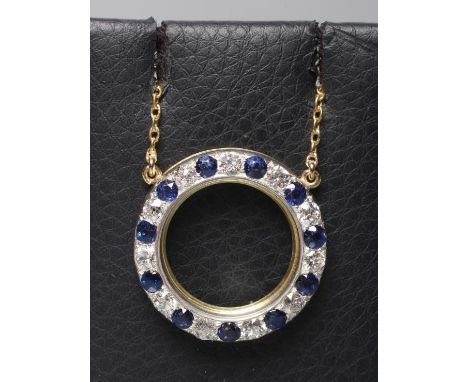 A SAPPHIRE AND DIAMOND CIRCLET PENDANT pave set with eleven sapphires and diamonds fixed to a plain unmarked chain necklace (