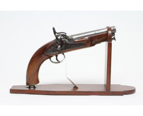 A TOWER PERCUSSION PISTOL with 6" barrel, action with double pin stripe border, crown over VR and 1861 over Tower, swivel ram