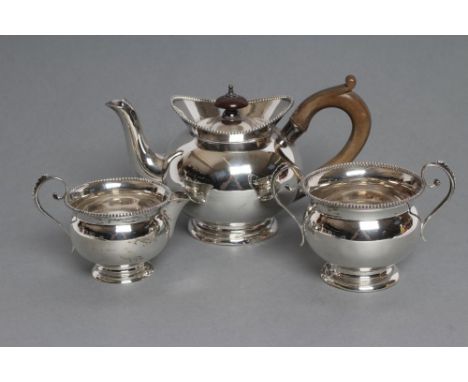 A LATE VICTORIAN SILVER THREE PIECE BACHELOR'S TEA SERVICE, maker William Aitken, Chester 1899, of globular form with beaded 