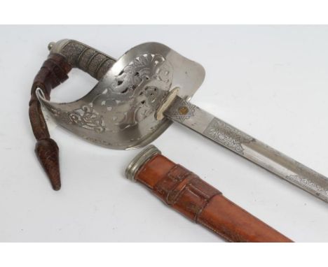 AN 1897 PATTERN INFANTRY OFFICER'S SWORD, the 32 1/4" blade etched with royal shield and Edward VII cypher amid foliage, make