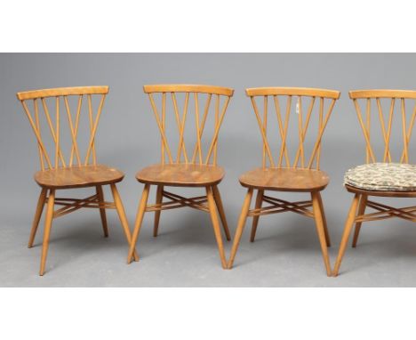 A SET OF FOUR ERCOL MODEL 376 LATTICE BACKED WINDSOR CHAIRS in a light finish with oyster seats, the legs joined by twin cros