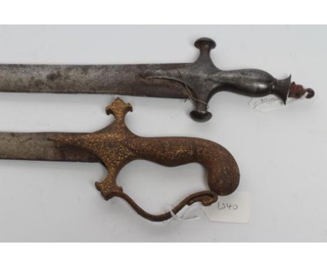 TWO INDIAN TALWAR, 19th century, comprising one with 24 1/2" curved blade and gilt inlaid hilt with knuckle guard, 30" long, 