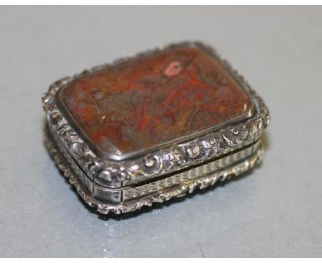 AN EARLY VICTORIAN SILVER VINAIGRETTE, maker Nathanial Mills, Birmingham 1833, the base with engine turning enclosing a small