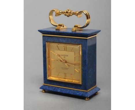 A MINIATURE LAPIS LAZULI CASED CARRIAGE CLOCK by Luxor, with spring driven movement, 1 3/4" gilt dial with Roman numerals and