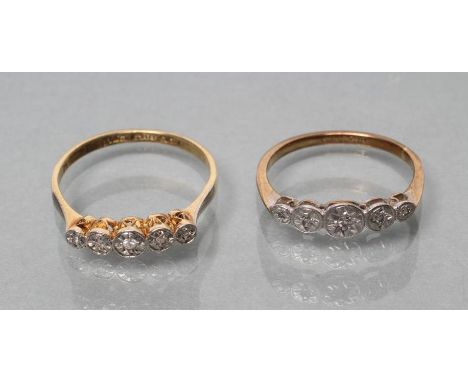 A PAIR OF ILLUSION SET FIVE STONE DIAMOND RINGS with plain shanks stamped 9ct, Plat, sizes K and O (Est. plus 21% premium inc