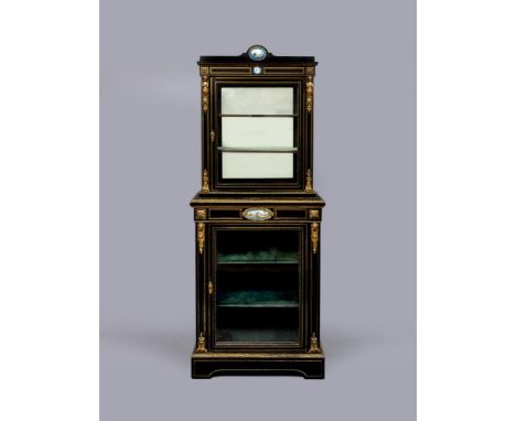 A VICTORIAN EBONISED AND BRASS INLAID PIER DISPLAY CABINET with gilt metal mounts and inset blue porcelain plaques, the upper