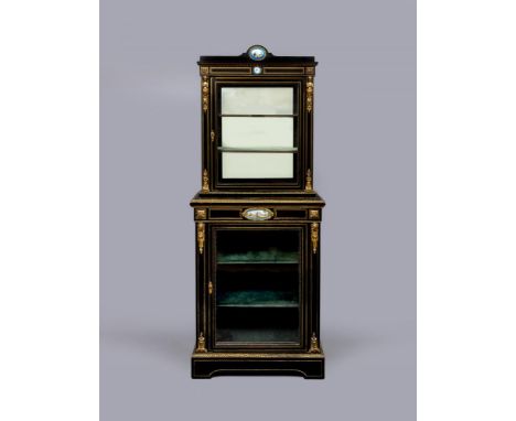 A VICTORIAN EBONISED AND BRASS INLAID PIER DISPLAY CABINET with gilt metal mounts and inset blue porcelain plaques, the upper