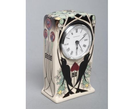A MOORCROFT POTTERY "TALWIN" PATTERN MANTEL CLOCK, 2017, of slightly flared rounded oblong form, tubelined and painted in col