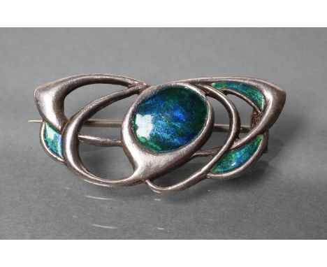 AN ARTS AND CRAFTS ENAMEL BROOCH, maker W H Haseler, stamped silver, the open entrelacs with blue/green enamelled panels (Est