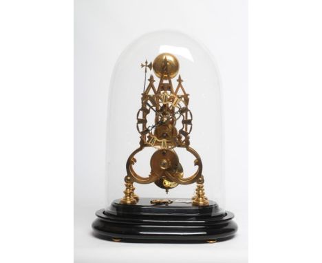 A BRASS SKELETON CLOCK, the single fusee movement with anchor escapement striking on a bell, 4 1/2" chapter ring with Roman n