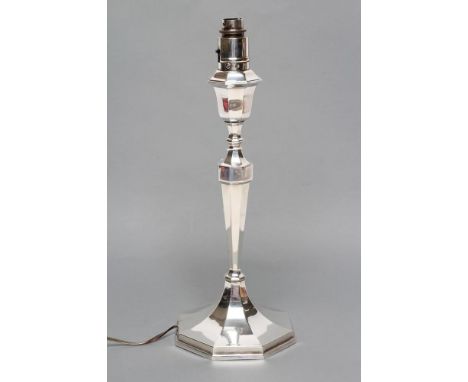 A SILVER ELECTRIC TABLE LAMP BASE, maker Blankensee & Son Ltd., Birmingham 1928, of swept octagonal form with tulip socket, 1