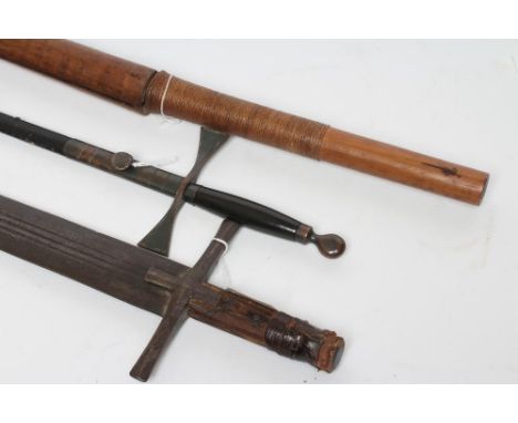 THREE SWORDS, comprising a masonic ceremonial sword with etched blade, a Burmese Dha sword with 28" blade and a North African